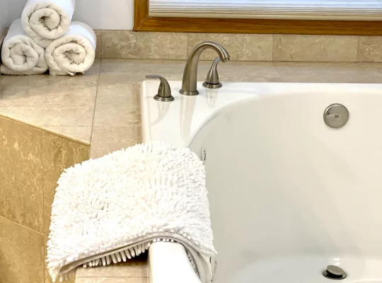 Large jetted tub in the primary bathroom.